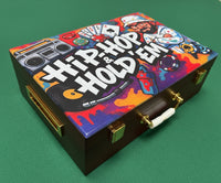 Colorful printed poker box with 'Hip-Hop & Hold'Em design on a metallic surface