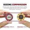 Comparison of standard and oversize poker chips held between two hands.