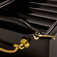 Black mahogany wood poker case opened corner view closeup with key shown.