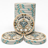 A set of Gatsby Room casino-style ceramic poker chips on a clean white background, featuring a stack of round chips in the back, one chip in the front center, and two chips in the front row. The chips have a cream base with teal and gold geometric borders and a central diamond design.