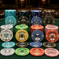 A collection of Gatsby Room themed ceramic poker chips in various colors and denominations, arranged in stacks and rows on a green felt surface with a dark leather background.