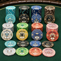 A set of Gatsby Room ceramic poker chips in multiple denominations and colors, neatly stacked and arranged on a green felt surface.