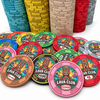 Lava Club ceramic poker chips with a pink $5,000 denomination chip in the forefront