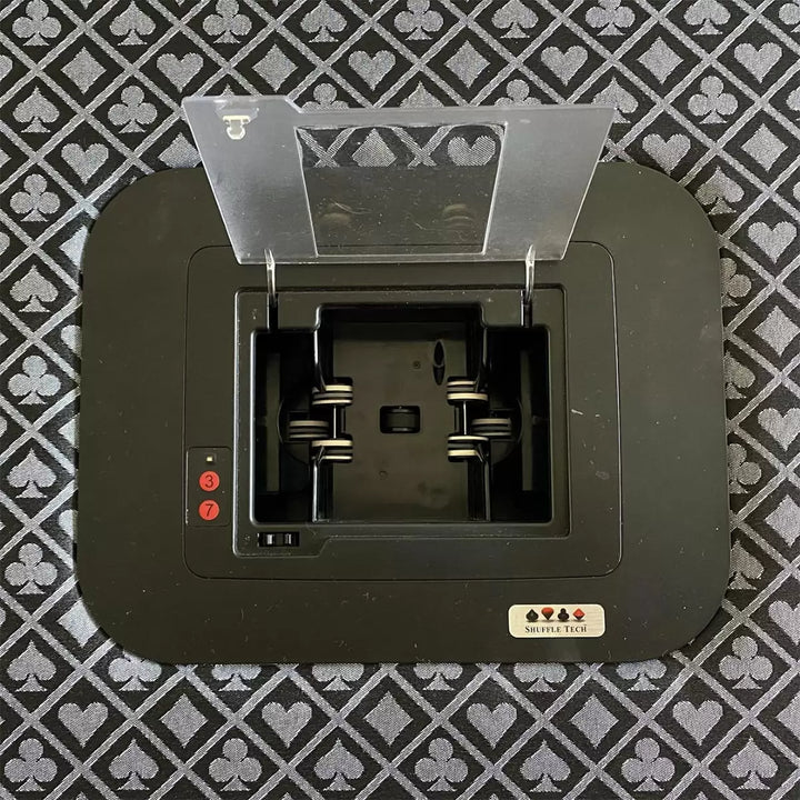 Shuffle Tech. Fully automatic card shuffler ST-1000 with flush mount kit installed in table, aerial view