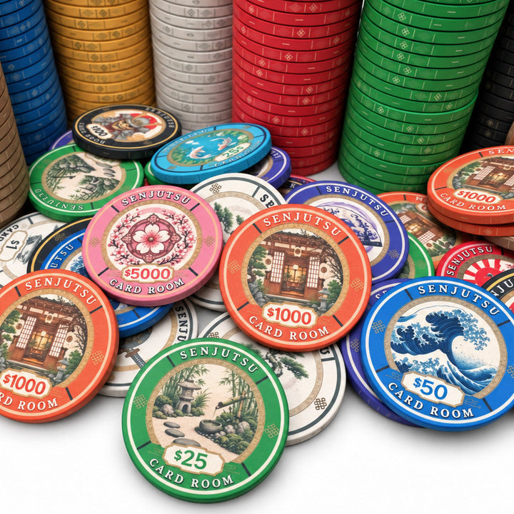 A collection of colorful ceramic poker chips from Senjutsu Card Room theme, with stacks of chips in blue, gold, red, green, black, and silver standing in the background, and several individual chips scattered in the foreground on a white background.