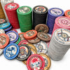 A collection of colorful Senjutsu Card Room ceramic  poker chips in stacks and piles on a white background, featuring various denominations and designs.