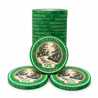 A stack of green $25 Senjutsu card room ceramic poker chips with a scenic illustration on the face, arranged on a white background.