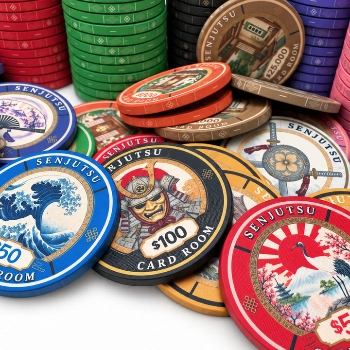 A collection of colorful Senjutsu Card Room poker chips in various denominations, including $5, $10, $20, and $100, arranged on a white surface with stacks of chips in the background.