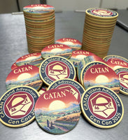 Stacks of 'Catan' custom ceramic game chips on a our stainless steel cooling production table.
