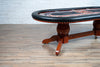 Rockwell Poker Table With Mahogany Napa Legs, Black Vinyl Armrest, and Custom Graphics Playing Surface - Side View