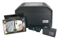 Shuffle Tech ST-1000 fully automatic card shuffler shown with power unit and playing cards. Playing cards not included.